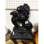 A Cast Iron Door Stop In The Form Of An Heraldic Lion
