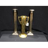 An Art Nouveau Brass Two Handled Vase Together With A Pair Of Plated Candle Holders