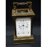 A 20th Century French Gilt Brass Carriage Clock By L`Epee, The Enamel Dial With Roman & Arabic