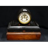 A Victorian Black Marble Encased Mantel Clock With Circular White Enamel Dial