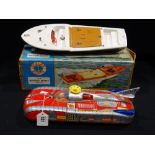 A Boxed Scalex Speedboat Together With A Tin Plate Battery Operated Space Car