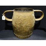An Art Nouveau Two Handled Brass Barrel Vase With Stylised Grape & Vine Embossed Design, Monogrammed