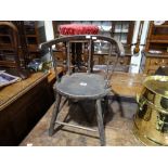 An Antique Circular Seated Spindle Backed Childs Chair