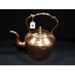 An Antique Copper Kettle