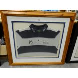 A Framed Hand Signed Golfing Jersey Autographed By Thomas Bjorn