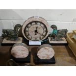 An Art Deco Pink Marble Clock Garniture Set, Decorated With Squirrels