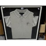 A Framed Hand Signed Golf Jersey Autographed By Tiger Woods