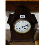 An Edwardian Oak Encased Mantel Clock With Circular Dial