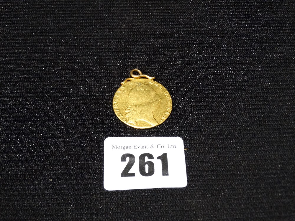 A 1793 Gold Spade Guinea With Suspension Loop