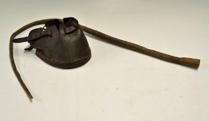Small Bullwhip in braided leather single tailed together with a leather horse hoof boot (2)