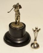 2x small silver golfing trophies to include golfing figure mounted on a wooden base, and white metal