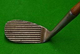 Spalding "Dedstop" mashie niblick with heavily ribbed face lines