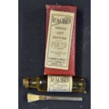 'Racko' Tennis Gut Reviver in original box and contained within glass bottle and includes brush,