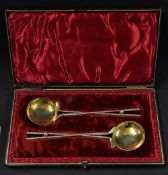 A rare pair of Captains golfing wine tasting spoons c.1895 - white metal handles formed as a pair of