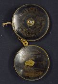Lawn Tennis Tape Measures contained within circular brass cases manufactured by F.H. Ayres,