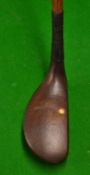 Dark stained persimmon mallet head putter stamped Tom Morris to the crown with white top aiming spot