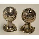 Pair of silver Bramble golf ball salt and pepper pots - hallmarked Birmingham 1915 both mounted on