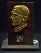 WWII German Adolf Hitler Metal Plaque of a left facing bust with gold leaf mounted to wooden