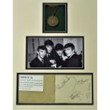 Pop Group the Beatles Autographed Page in Original Book: Autographed by all four members Paul, John,