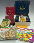 Box of various Games to include Arabian Snakes and Ladders, Draughts, Trivial Pursuit Master Games