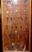 FRAMED LURES: Assorted collection of metal, wood and rubber baits incl. Allcock Spanguloid