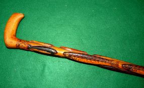 WALKING STICK: A fine antique hand carved walking stick with various fish and bait in relief,
