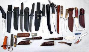 KNIVES ( 19) A collection of knives in assorted styles, fixed blade hunting, skinning and