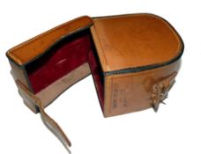 REEL CASE: Fine Hardy block leather fly reel case, red baize lined, internally measures 4.25"x2",