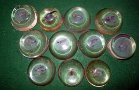 PAPER WEIGHTS: (11) Eleven resin paperweights from 2.5"-3" diameter, each containing a salmon fly of