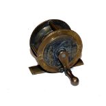 REEL: Fine Heaton's all brass fishing scene reel, 2" diameter, 1" wide with heavily embossed