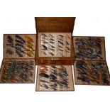 FLY CABINET: Fine Farlow of London oak fly reservoir containing a large collection of vintage salmon