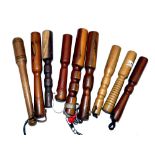 PRIESTS: (9) Collection of 9 wooden turned salmon/trout priests, 6"-8" long, in various woods