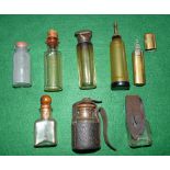 OIL BOTTLES: (8) Collection of 8 vintage fly and reel oil bottles, incl. a Helical Casting Co.,
