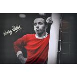 Nobby Stiles Signed Print in Manchester United Kit, framed and glazed measures 46 x 36cm approx.