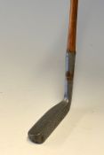 An unusual W.R. Reith of Eltham shallow narrow metal mallet head Putter showing Three Crowns stamped