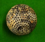 Springvale Kite bramble pattern rubber core golf ball - retaining some of the white finish with