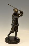 Large spelter golfing figure - mounted on a circular base overall 11.5"h