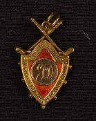 1924 Merchants of Edinburgh Golf Club 9ct gold and enamel medal engraved on the reverse "Won by J