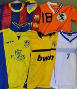 Selection of Junior Football Shirts includes Barcelona, Holland, Leeds, Holland, Leeds United,