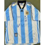 1990 Argentinian international shirt with signatures of seven players. Given to the vendor by the