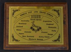 1995 Rugby World Cup brass plaque -mounted on a wooden plaque inscribed World Cup 1995 South