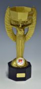 1966 England World Cup Trophy a reproduction trophy, height 10.5" x 3.5" at the base, appears in a