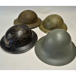 A collection of classic WWII helmets - comprised of 2x Brodie or Tommy helmets, a Zuckerman or Civil