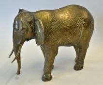 Brass African Elephant a large statue of an African elephant in brass, measures 25 x 35cm approx.