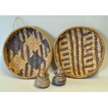 Two East African Decorative Winnowing Baskets measuring 29cm diameter, together with a lovely pair
