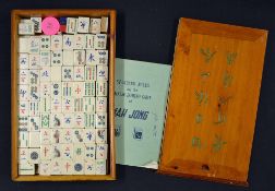 Interesting Mah Jong Chinese Domino Game appears to include bamboo and bone tiles encased within