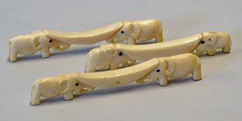 Early Ivory Spoon Rests carved to depict Elephants curved centre piece, all measures 11cm approx.,