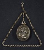 White metal Oval Pendant with embossed Indian Decoration containing photographs of uniformed male