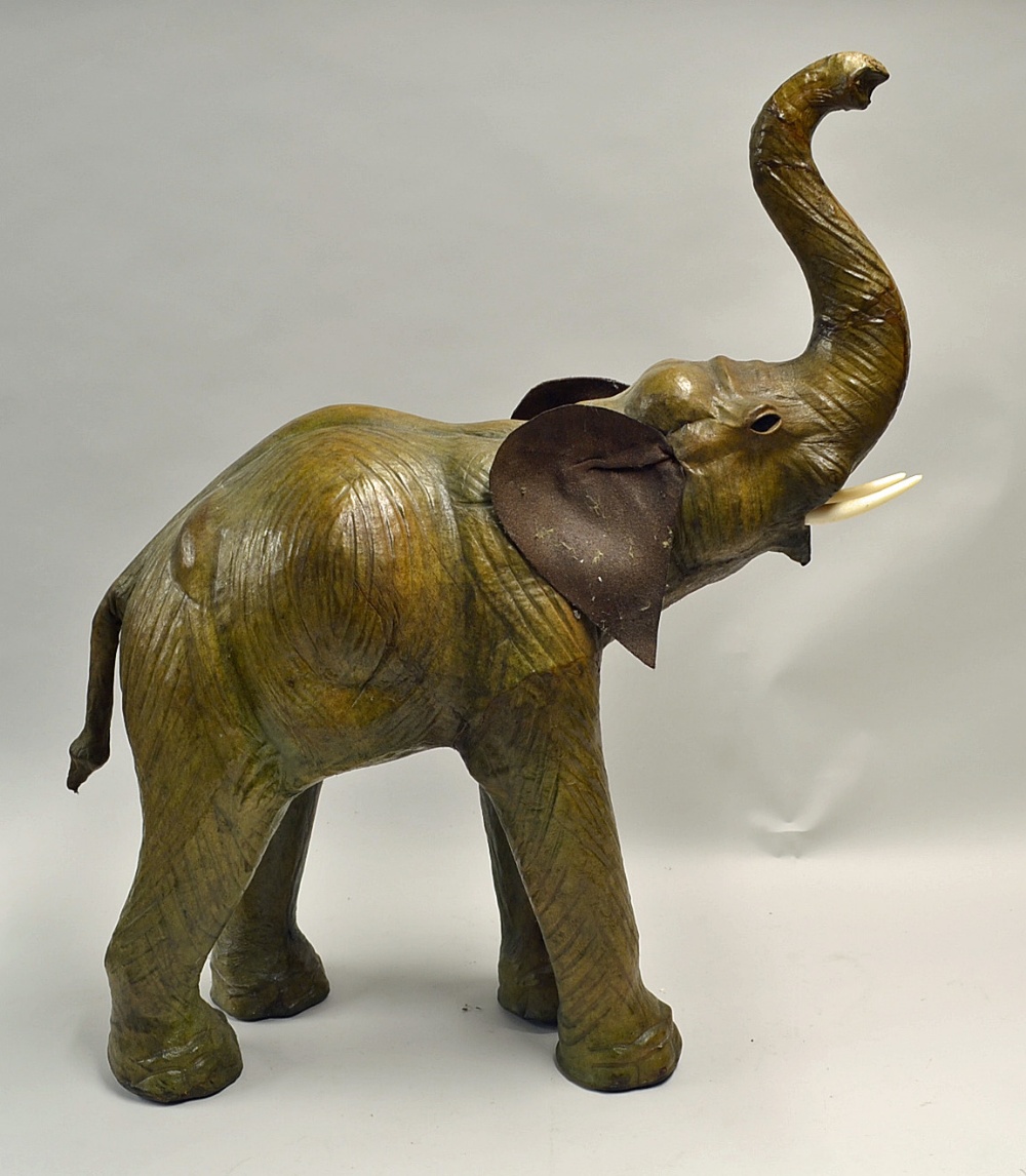 Large Handmade Leather Elephant appears in good condition, measures from floor to tip of trunk