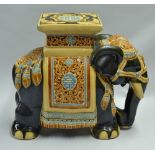 Large Ceramic Elephant Plant Stand decorated in traditional dress, for good luck, brown in light